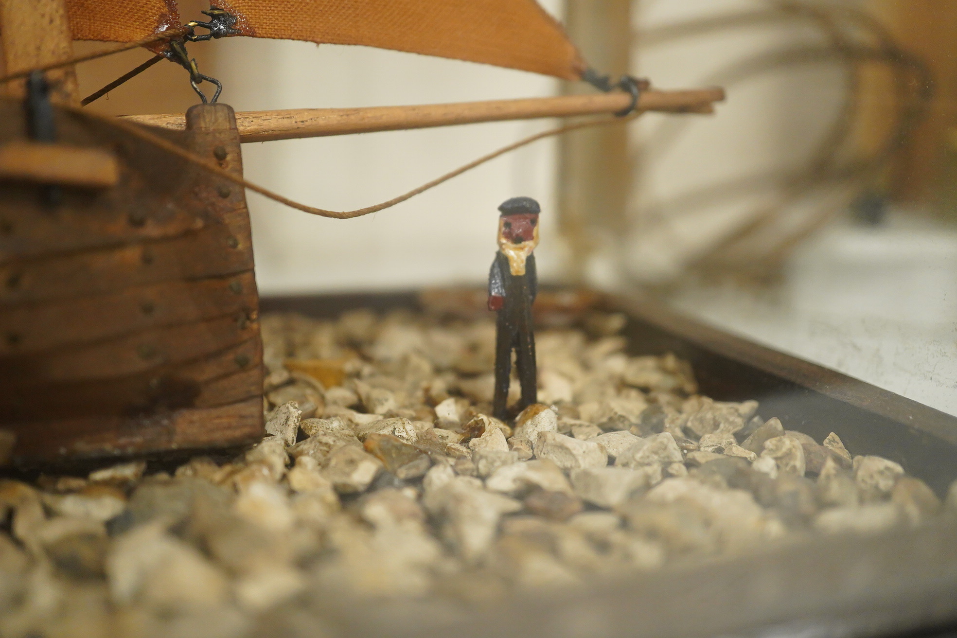 A cased scratch built model of a Hastings lugger of 1870, 40cm wide